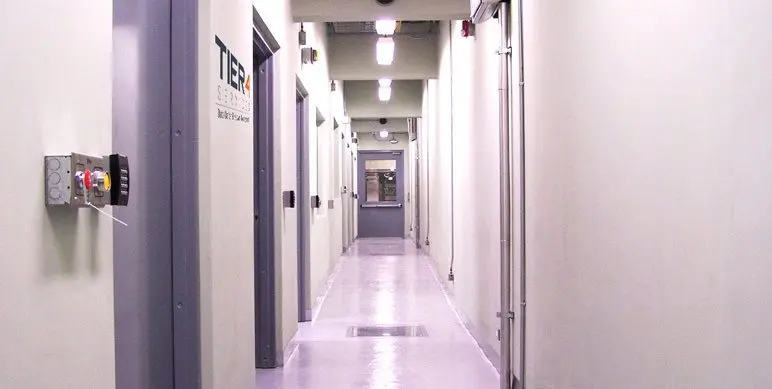 Corridor of a secured data center with access-controlled doors